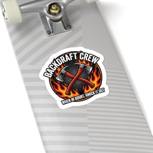 May include: A sticker featuring the text "BACKDRAFT CREW" in a semi-circle above two crossed axes. The axes are set against a fiery background with the text "WHEN IN DOUBT, KNOCK IT OUT" below.