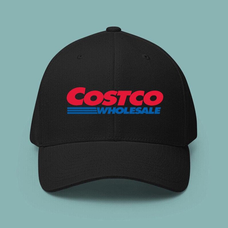 May include: Black baseball cap featuring the Costco Wholesale logo in red and blue. The cap has a curved brim and a structured fit. The text "Costco" is in a bold, red font, with "Wholesale" in blue below.