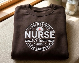 Retired Nurse Sweatshirt: I Love My New Schedule Embroidery – Unisex Cotton Blend