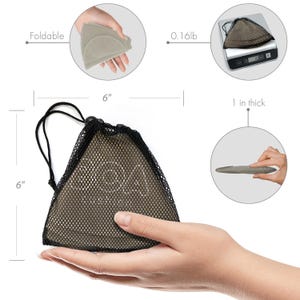 May include: A beige, foldable bra insert set, shown in a black mesh bag. The bag is 6 inches by 6 inches. The inserts are 1 inch thick and weigh 0.16 pounds. The inserts are shown folded and unfolded.