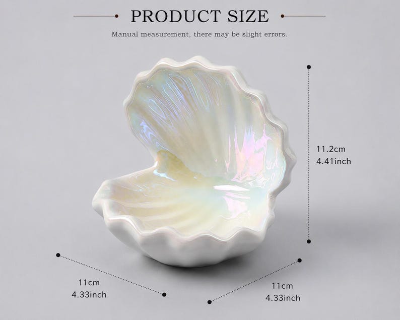 以下が含まれることがあります： 光沢のある仕上げの虹色の貝殻型ディッシュ。PRODUCT SIZEおよびManual measurement, there may be slight errorsというテキストが表示されています。寸法は高さ11.2cm、幅と奥行きは11cmです。
