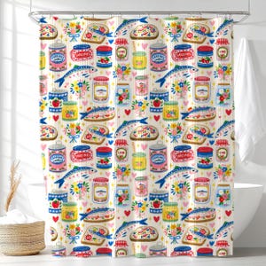 May include: A shower curtain featuring a repeating pattern of sardines on toast, colorful floral bouquets, various glass jars with lids, and blue sardine cans with the text SARDINES, interspersed with small red hearts and yellow star shapes.