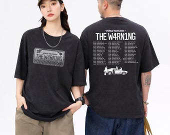 Camiseta del concierto Warning World Tour 2026, merchandising para fans de la banda de rock.