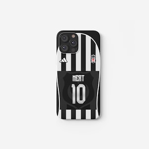 May include: Black and white striped phone case resembling a soccer jersey. The case features the number 10 and the name "MERT" on the back. The Adidas logo and a team emblem are also visible.