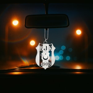 May include: A set of three ceramic mugs with a speckled, matte finish. The mugs are in shades of cream, light gray, and dark gray. Each mug has a simple, minimalist design, perfect for coffee or tea.