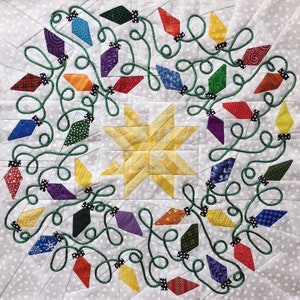 May include: A white background with a yellow star in the centre surrounded by a string of colourful diamond-shaped lights. The lights are connected by a green string with black dots.