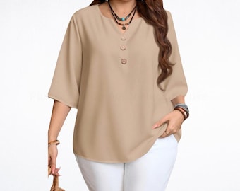 Blusa de talla grande con cuello en V: Top casual de color liso y corte holgado.