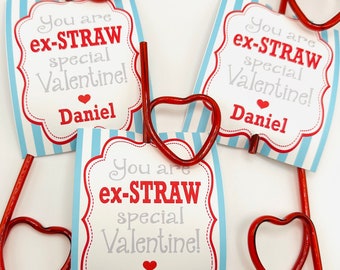 May include: Three red heart-shaped straws with blue and white striped cards attached. The cards have the text "You are ex-straw special Valentine!" with the name "Daniel" printed below.