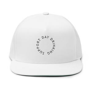 May include: White flat-brimmed baseball cap with a curved brim. The cap features the text "DRINKING DAY SUPPORT" in a circular arrangement in black font. The cap has a button on top and a green underside of the brim.
