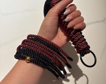 Crimson & Black Handwoven Nylon Flogger with Gold Beads