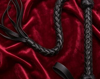 Black woven leather whip with tassel embellishments, 123 cm, handmade.