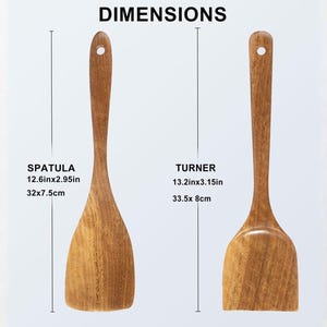 May include: Two wooden kitchen utensils: a spatula (32 x 7.5cm) and a turner (33.5 x 8cm). Both have a natural wood grain finish and a hole in the handle for hanging. The image includes dimensions in inches and centimeters.