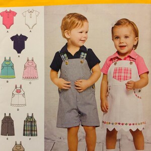 Patrón Simplicity 1169 para bebé, niña o niño, conjunto de peto, mono y body, tallas XXS-L, sin cortar.