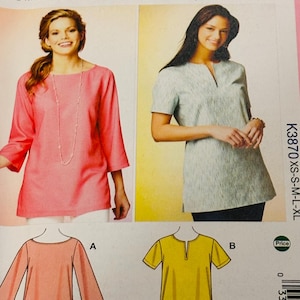 Puede incluir: Patrón Kwik Sew K3870 para tops de mujer. El patrón incluye imágenes de un top rosa coral con mangas largas y un top azul claro con mangas cortas. El patrón también muestra diagramas de los diseños de los tops.