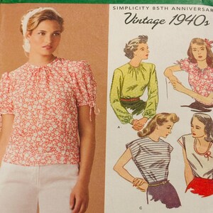 May include: A woman wearing a red floral print blouse with white pants. The image also shows a vintage Simplicity sewing pattern from the 1940s, featuring illustrations of various blouse designs. The pattern includes size information.
