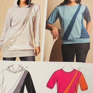 Puede incluir: Imagen de dos mujeres con diferentes estilos de tops. Una es una sudadera con capucha gris claro con un panel de lentejuelas. La otra es una blusa azul claro con una franja diagonal azul oscuro. Debajo hay ilustraciones de tops similares.