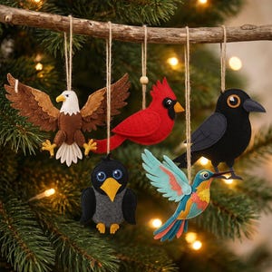 May include: A collection of felt bird ornaments hanging from a branch. The ornaments include an eagle, cardinal, crow, and hummingbird, each with detailed stitching and vibrant colors. The background is a blurred Christmas tree.