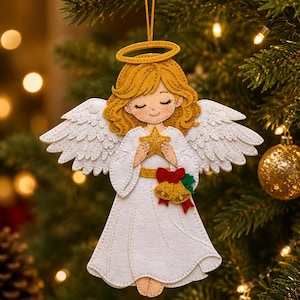 May include: A felt Christmas tree ornament shaped like an angel with golden hair, a yellow halo, and white wings. The angel wears a white robe, holds a gold star, and features a small red bow with two gold bells attached to the waist area.