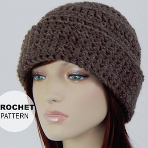 May include: A brown crocheted beanie hat with a slouchy fit. The hat is made with a simple stitch pattern and has a wide brim. The text "CROCHET PATTERN" is visible in the image.