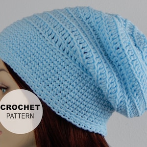 May include: A light blue crochet beanie hat. The hat is made of soft yarn and has a ribbed texture. The text "CROCHET PATTERN" is displayed on the image.