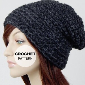 May include: A gray crocheted beanie hat with a slouchy fit. The hat is made with a textured stitch and has a simple design. CROCHET PATTERN is written on a white circle in the image.