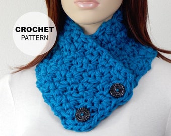 May include: A teal blue crocheted neck warmer with two decorative buttons. CROCHET PATTERN is written in white text on a white circle.