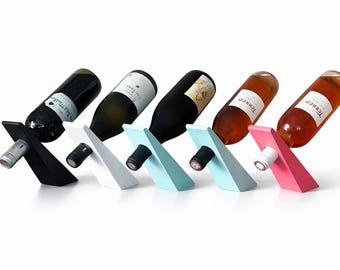 Soporte flotante para botellas