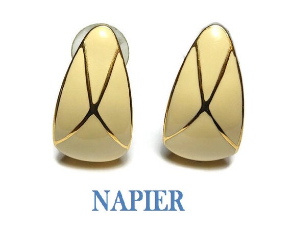 Napier cream enamel earrings, cream drop post with gold embellishments  x across the front ridged bottom, pierced earrings