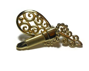 Don Lin lipstick mirror brooch, matte brush gold finish, lovely scroll work, unique style for Don Lin, 1980s