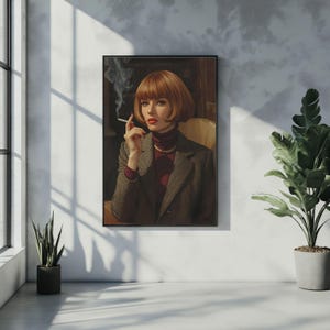 May include: Framed art print featuring a woman with red hair, wearing a gray blazer and a burgundy turtleneck, holding a lit cigarette. The artwork has a vintage aesthetic, with a pearl necklace and a dark background.