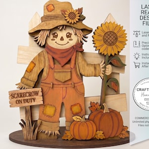 May include: Wooden scarecrow figure with a sunflower, pumpkins, and a fence. The scarecrow wears overalls and a hat with a sunflower accent. A sign reads "Scarecrow on Duty". Laser-ready design files are available.
