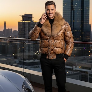 May include: A brown snakeskin-patterned puffer jacket with a fur collar and black trim. The jacket is worn with black pants. The background features a cityscape at sunset.