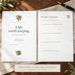 May include: A white paper journal titled A life worth keeping, featuring a floral illustration, a blank line for a name, and a second page titled The place it all began with numbered prompts for recording family memories and stories.