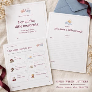 May include: A set of printable stationery featuring three white sheets with maroon text and watercolor illustrations. The pages include "For all the little moments," "Open when you need a little courage," and a sheet of six "Little labels, ready to give."