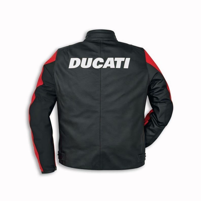 May include: Black motorcycle jacket with red accents on the sleeves. The word "DUCATI" is printed in white across the back. The jacket has a stand-up collar and adjustable waist straps.