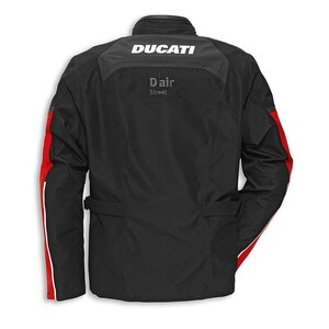 May include: A black motorcycle jacket with red and white accents on the sleeves. The back features the white text DUCATI at the top and the grey text D-air Street below it. The jacket has a high collar and adjustable side waist straps.