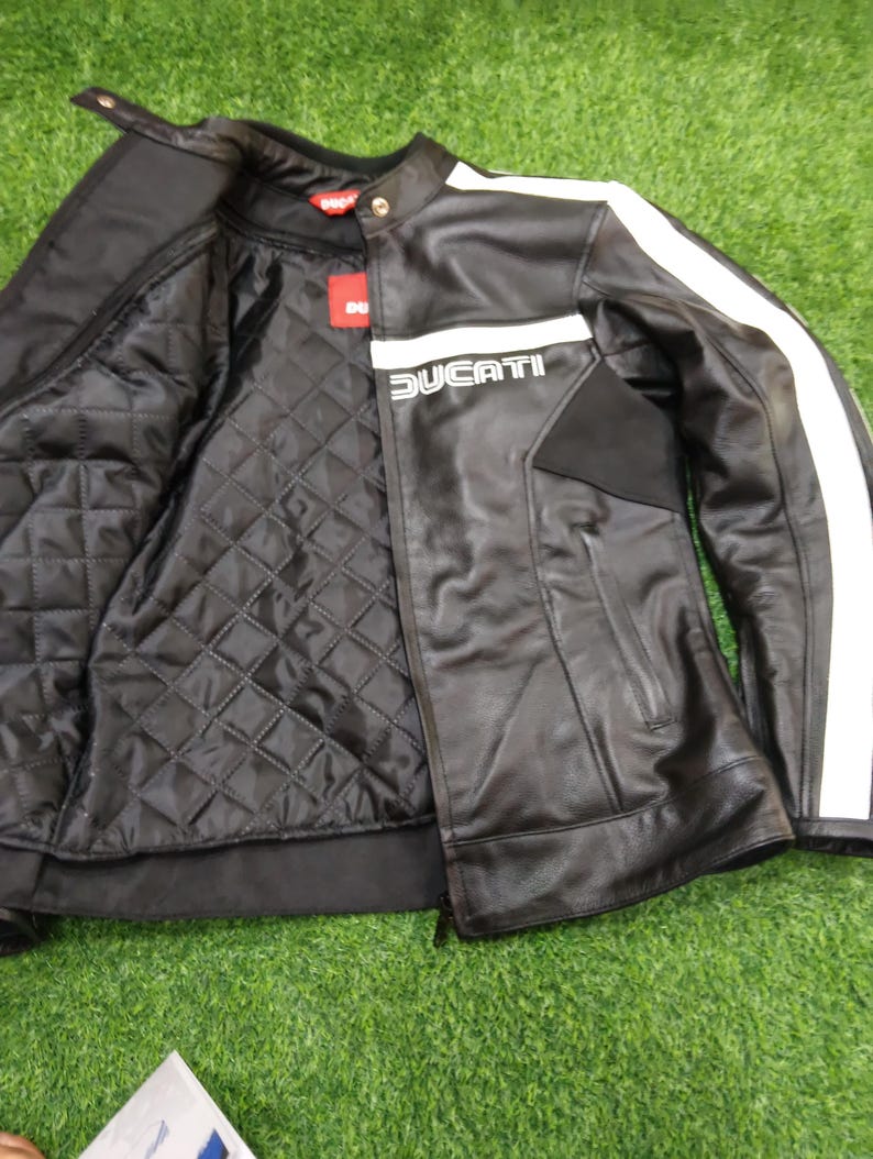 Svart och vit Ducati Dainese lädermotorcykeljacka från 80-talet. bild 3