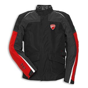 May include: A black motorcycle jacket featuring red panels on the sleeves, a high collar, and a front zipper closure. The Ducati logo is displayed on the left chest, while the word D-air is printed on the right sleeve and Ducati on the left.