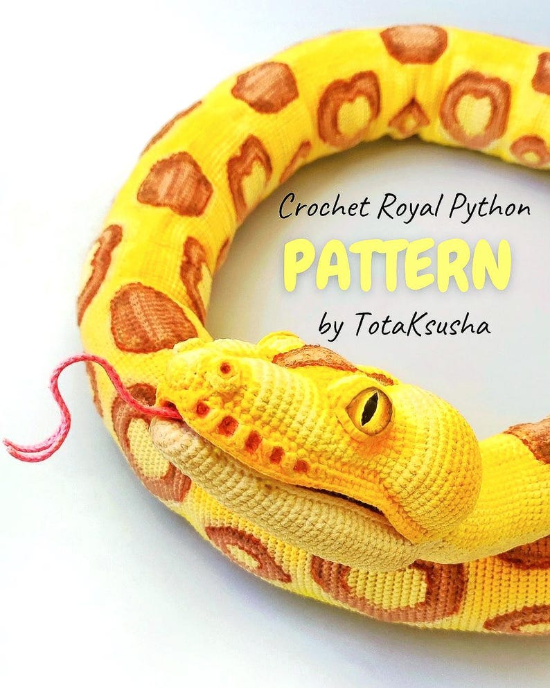May include: A crocheted Royal Python snake in yellow and brown, with a pink tongue. The snake is coiled, with the head in the foreground. The text "Crochet Royal Python PATTERN by TotakSusha" is visible.