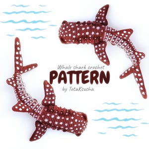 May include: Two brown and white crocheted whale shark figures with spotted patterns. The text reads Whale shark crochet PATTERN by TotaKsusha, accompanied by light blue wavy lines representing water on a white background.
