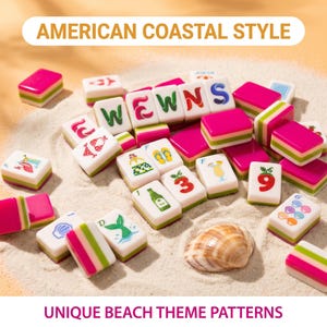 May include: A collection of rectangular mahjong tiles featuring beach-themed illustrations including flip-flops, cocktails, seashells, and a mermaid tail, alongside tiles with letters spelling EWENS and numbers, all resting on a sandy surface.