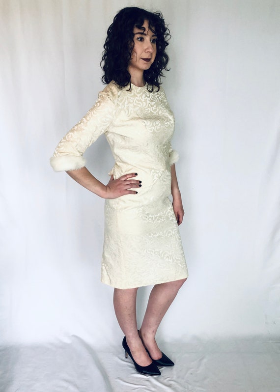 white dress with fur bottom