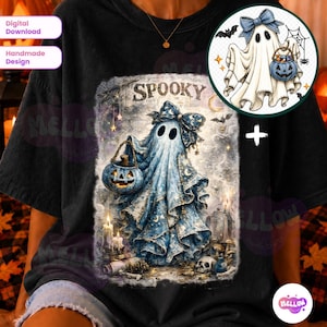 May include: A black t-shirt featuring a large graphic print of a ghost wearing a blue bow, holding a jack-o'-lantern bucket, with the text SPOOKY above it. The design includes stars, candles, a skull, and a smaller circular ghost illustration.
