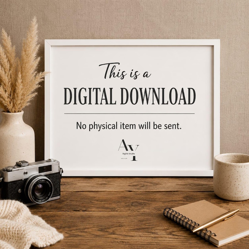 May include: A framed white sign with the text "This is a DIGITAL DOWNLOAD" and "No physical item will be sent." A vintage camera, a beige mug, a notebook, and a pen are on a wooden surface.