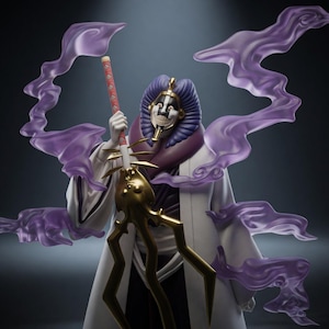 May include: A detailed figurine of a character from the anime series Bleach. The figure is wearing a white robe with a purple collar and a mask with a smiling face. The figure is holding a sword with a red and gold handle, and purple smoke-like effects surround the figure.