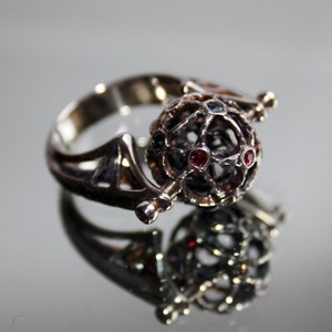 Sterling silver ring with natural diamond, sapphires and rubies.