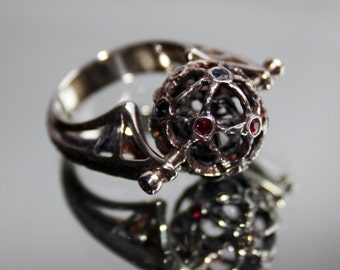 Sterling silver ring with natural diamond, sapphires and rubies.