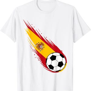 May include: A white short-sleeved t-shirt featuring a graphic of a soccer ball trailing a comet-like streak colored with the red and yellow stripes of the Spanish flag, including the national coat of arms centered within the yellow stripe.