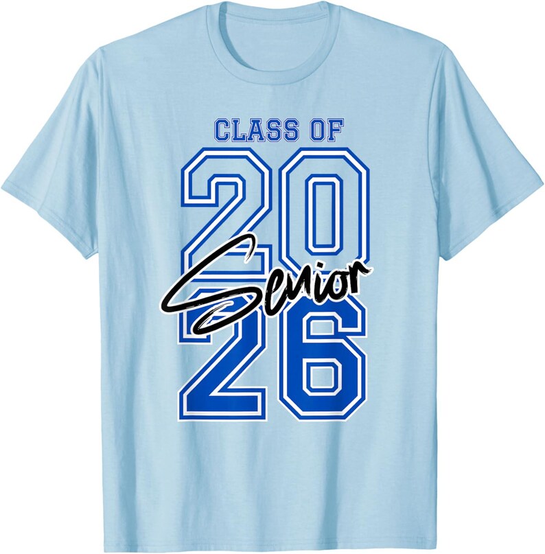 May include: Light blue t-shirt with the text "CLASS OF 2026 Senior" in blue and black. The numbers "2026" are in a bold, outlined font. The word "Senior" is in a cursive font, centered below the numbers.