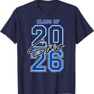 May include: Navy blue t-shirt with the text "CLASS OF 2026 Senior" in white and blue. The numbers "20" and "26" are in a bold, outlined font. The word "Senior" is in a cursive font.